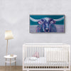 A minimalist nursery featuring a white crib, round side table with lamp and decor, and a large Cow Life Inspired Gallery Wrap Canvas by Artsy Ems Designs displayed on a light gray wall.