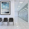 A modern waiting area features three black chairs from Artsy Ems Designs set against a white wall, a large abstract painting above, and a hallway with glass panels and bright overhead lights.